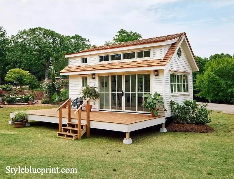 Tiny house comes with a greenhouse and porch - Curbed