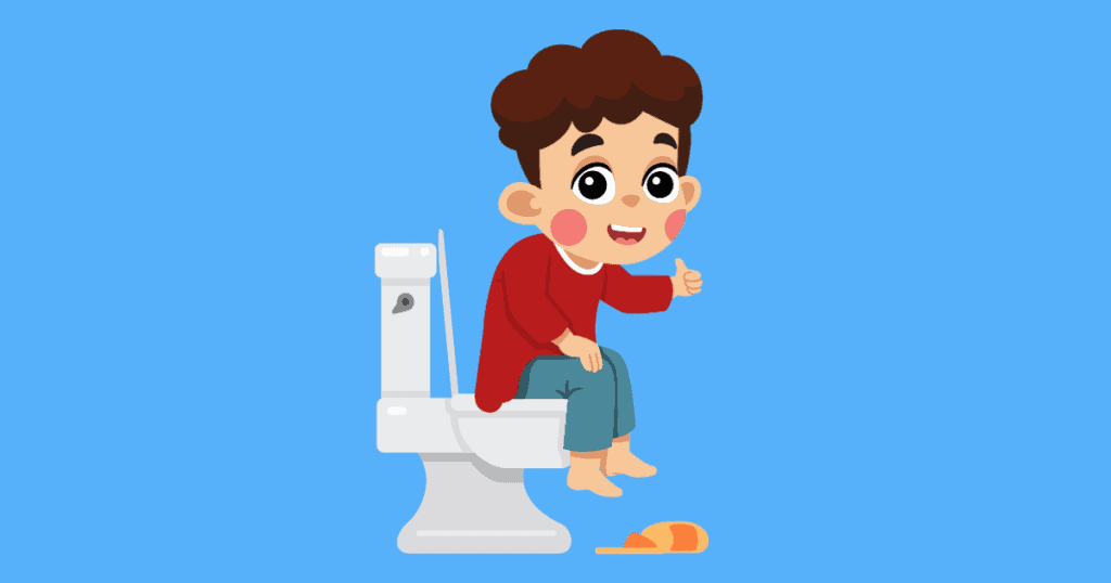 little boy sitting on the toilet