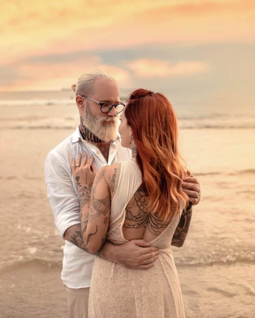 UNDERSTANDING HOPA: RULES FOR 55+ HOUSING COMMUNITIES 4 a man and woman hugging on a beach